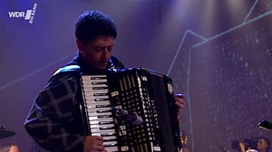 Here's another beautiful piece by Maria Schneider., "Choro Dançado", from Maria's 2004 album "Concert In The Garden". It's the first movement of the suite "Three Romances" and features Gary Versace on accordeon. Recorded live in Viersen, 2006. | WDR Big Band