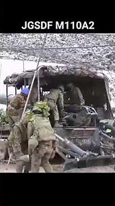 Japanese soldiers firing an M110 howitzer #military