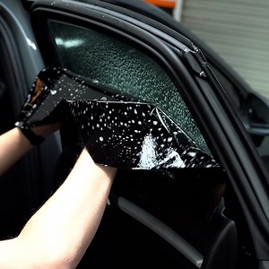 Elliot Baker, the founder of Tint School Online, demonstrates his process for perfectly installing window tint. | Transportation Insider