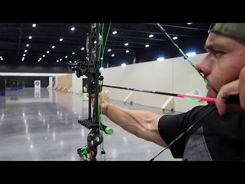SHOOTING A BOW IN SUPER SLO MOTION