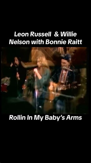Leon Russell, Bonnie Raitt, Maria Muldaur, & Willie Nelson. Rolling In My Sweet Baby’s Arms. 1979 | Brady Seals