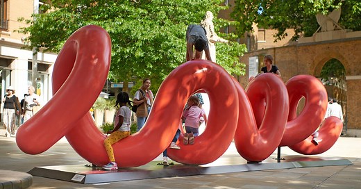yoni alter's climbable sculpture in london unravels to reveal the word 'love'