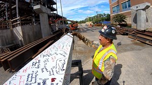 4.7K views · 85 reactions | Last week, Virginia Tech, the Virginia Tech Carilion Research Institute, Carilion Clinic, and partners marked the progress of construction on the new 139,586 square-foot Virginia Tech Carilion Biomedical Research Addition.  They did so by placing a final signed beam into the framework of the building, expected to open in spring 2020.  Read more  ow.ly/xXEB30m5nBh | Virginia Tech | Facebook