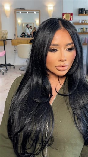 Long Black Hair with Flippy Layers and Gloss Styling Inspiration