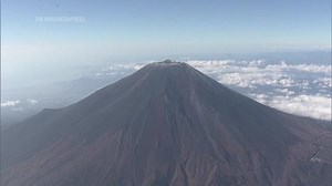 Snow finally arrives at Japan's Mount Fuji after the longest wait in 130 years