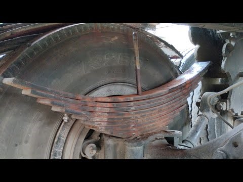 Replacement of center bolt and repair of leaf spring system of Hino 10 wheel truck
