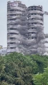 Noida Supertech Twin Towers demolition The Supertech twin towers in Noida were demolished on Sunday, ending a nine-year-long legal battle. The nearly 100-metre-high structures – taller than Delhi’s iconic Qutub Minar (73 metres) – were brought to the ground in seconds. Minutes after the demolition, the nearby buildings appeared to be safe. A detailed safety audit is expected later. The air quality and visibility was extremely low. | Aawaz e kashmir