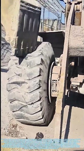Stuck Tire Takedown: The Excavator's Unorthodox Extraction Tool