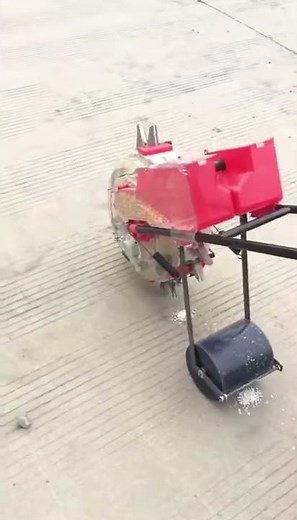 Hand push seeder with fertilizer