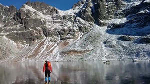 As close to walking on water as you'll ever get! Hiking on crystal clear ice in Tatra Mountains, Slovakia. | Worldatlas.com