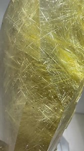 21K views · 290 reactions | This shimmery specimen is rutile quartz - smoky and clear quartz with golden needle-like inclusions. It’s prized for its striking, hair-like patterns and optical depth and we've displayed it on a custom, rotating stand. Tag someone who NEEDS this in their home! 朗 | Rare Earth Gallery | Facebook