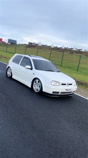 Exploring a Candy White Hybrid Car on Port Sundays