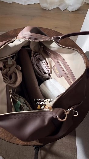 5.6K views · 17 reactions | in love with this Mina Baie bag 癩 linked all my diaper bag essentials here: https://amzlink.to/az0V3IPeI77uN pack my diaper bag with me, diaper bag, Emmy full diaper bag, diaper bag essentials, nesting, first time mom, 2025 baby #diaperbag | Hey Katie Sue | Facebook