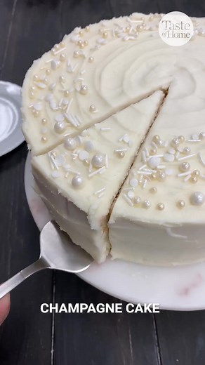 Cheers to the New Year with a slice of champagne cake! 🍰 Get the recipe: https://trib.al/9tPZJ6j #champagne #champagnecake #NewYearsEve #newyearseveparty | Taste of Home