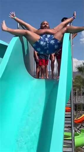 He Tried Doing the Splits Down a Waterslide…😳💦😂 #waterslidefails #funnyshorts #ai