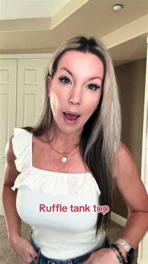 Who doesn’t love a little ruffle? This sweet tank fits perfectly, long enough for tucking and fits true to size. Under $24 (prices subject to change) Imily Bella is on 🔥 for this one. #ootd #outfitinspo #momtok #nurselife #fyp