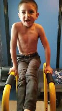 Ripped 6 year old doing ab workout, leg raises