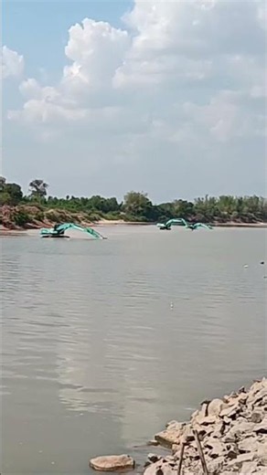 Excavating to redirect water flow and reduce bank erosion
