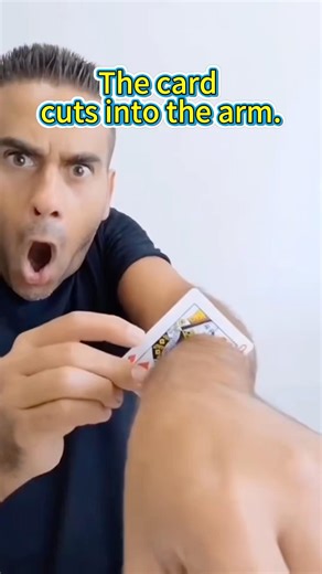 The card cuts into the arm. #magic #magician