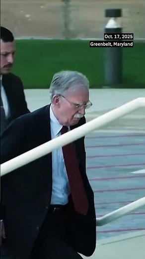 Ex Trump adviser John Bolton arrives at court to surrender
