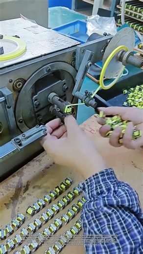 Taping machine works steadily for mass‑producing electronic transformers