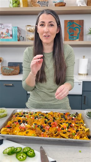 The ultimate nacho recipe is loaded, melty, and built to feed a crowd—perfect for your New Year’s party spread. Layered with chips, cheese, seasoned meat, beans, and all the toppings, it’s the kind of messy, shareable snack that disappears in minutes. Don’t forget the sour cream and guac. https://thestayathomechef.com/ultimate-nacho-recipe/ | Recipes
