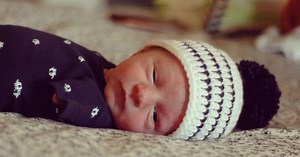 Boy born without arms or legs: Now watch the heartwarming moment he takes his first 'steps'