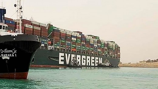 Egypt's Suez Canal blocked by stranded container ship blown sideways in dust storm
