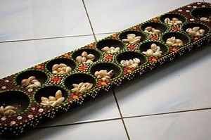 Cara Bermain Dakon atau Congklak, Permainan Tradisional yang Seru - Sonora.id