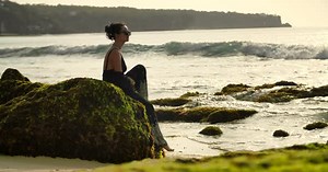 Girl on the Beach at Sunset Bali Indonesia