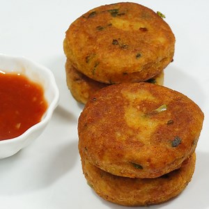 Potato Patties Recipe - Evening Snack Recipe - Aloo Patty For Burger Ingredients Mashed potatoes - 200 grams Corn flour - 1/4 cup Besan flour (gram flour) - 1 tbsp Turmeric powder - 1/4 tsp Chili powder - 1 tsp Cumin Powder - 1/2 tsp Garam masala - 1/2 tsp Amchur powder - 1/2 tsp Salt - As per taste Ginger garlic paste - 1 tsp Green chili chopped - 1 Coriander leaves - a handful Oil - as needed for shallow fry | Kitchen Platform