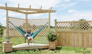 DIY Outdoor Hammock Stand {with Floating Deck & Pergola!}