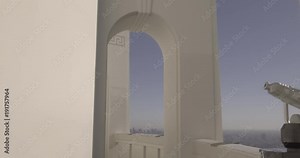 Tracking Through The Archways At The Observatory Overlooking Downtown Los Angeles