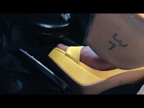 Driving with high heels under the pedal view