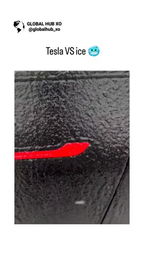 GLOBAL_XO on Instagram: "The post features a 15-second video of a person scraping ice off a Tesla's flush door handle with a red tool during freezing weather, humorously contrasting it with traditional cars via the caption "Tesla VS ice ," which garnered over 950,000 views and 2,800 likes in under 12 hours. This highlights a recurring winter challenge for Tesla owners due to retractable handles that can freeze shut from ice buildup in hinge points, as documented in Tesla's owner manuals and foru