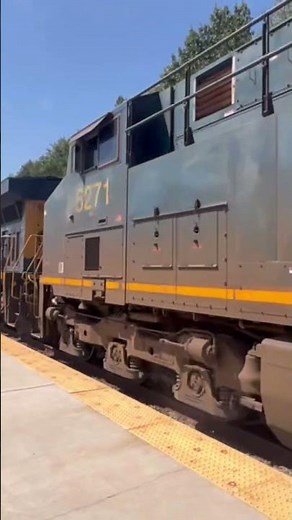 M410-13 with CSX engine #5323 leading with a horn show