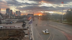 The sun sets on a beautiful Fall day at the Museum with USS Constitution, Dry Dock 1, and the Boston skyline in view. What's outside your window? #OurWindowtotheWorld #Boston | USS Constitution Museum