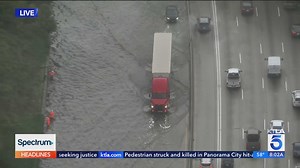 Flooding closes lanes, creates traffic nightmare on 405 Freeway in Long Beach