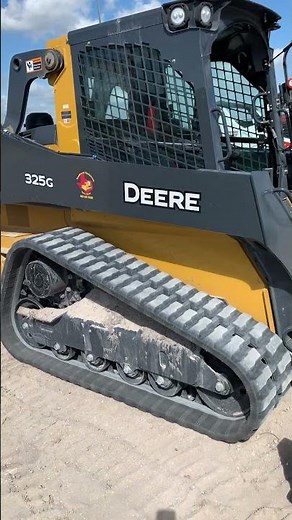 John Deere 325g track loader with a Kubota grading scraper