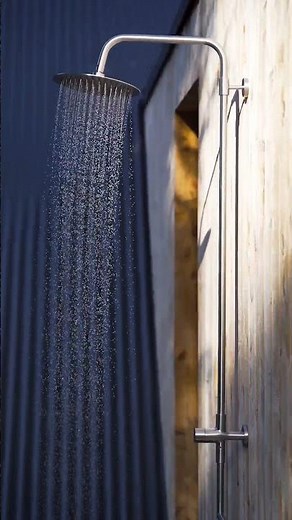 An immersive outdoor shower design at a tiny A-frame cabin in the Southern Alps