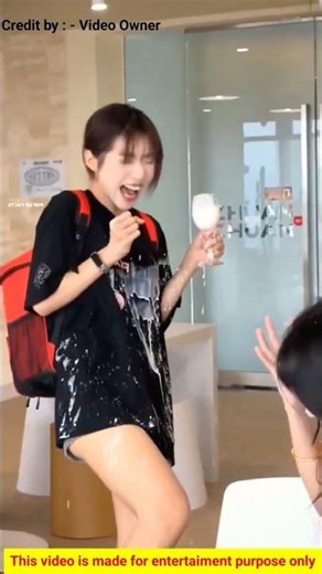 girl throws fake milk in office prank