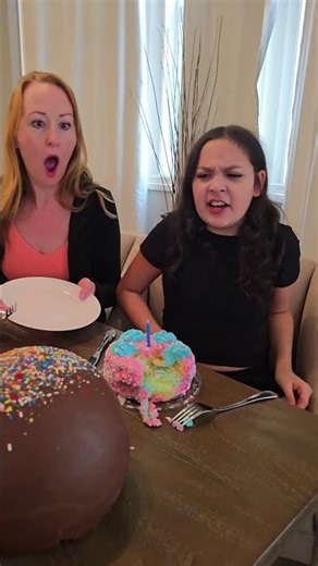 He broke her birthday cake with his hand