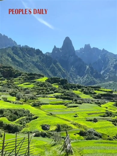 17K views · 831 reactions | How would you like to wake up to this view every morning? Drawing back the curtains reveals a breathtaking view outside the window with clear blue skies, lush green grass, and towering mountains. | People's Daily, China | Facebook