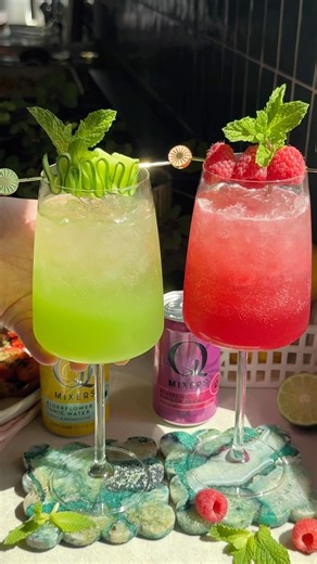 Lexi Harrison & Beth Sinclair on Instagram: "Which spritz are you choosing: Raspberry Hibiscus Ginger or Cucumber Elderflower? 🌺🥒 Both are so refreshing, vibrant, floral and perfect for spring/summer entertaining! #QPartner 21+ Each of these starts with a fresh purée, which couldn’t be any easier to make. Just blend and strain! Raspberry is paired with Q HIBISCUS GINGER BEER, lime juice & prosecco (or non-alc sparkling wine) – it’s fruity, a little spicy, floral, bright and tart 