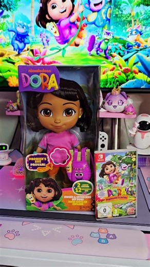 [AD] 🎊Celebrating 25 Years with Dora The Explorer: Sing with Me Dora interactive doll 🩷🏞 With the new interactive Dora doll, you can sing along with the adventurous heroine and learn your first English/Deutsch/Spanish words 🇺🇸 🇩🇪 🇪🇸 Featuring two songs and more than 25 phrases and sounds, you'll immerse yourself in Dora's colorful Latin American world and learn along the way. You can even purchase separately the Nintendo Switch game "DORA Regenwald in Gefahr"/"DORA Rainforest Rescue" fo