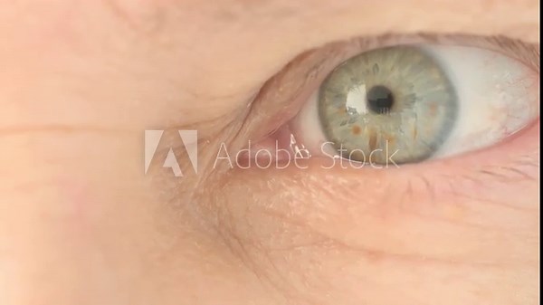part mature female face closeup, woman 50-55 years old looks carefully examines wrinkles around eyes, age-related changes, aesthetic injection cosmetology, care anti-aging procedures