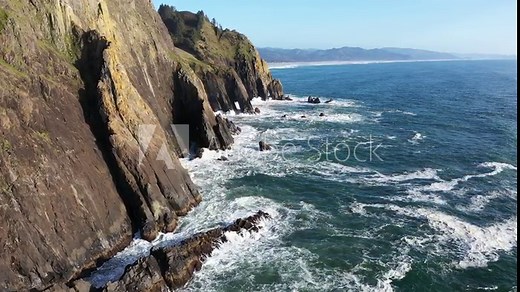 4k Aerial drone video footage of Devil's Cauldron at Elk Flats Trail in the beautiful Oregon Coast, with amazing rocky beaches, and great views towards the Pacific Ocean. High quality travel video.