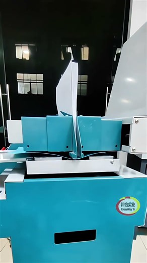 its an perfect and automatic books binding blue machine