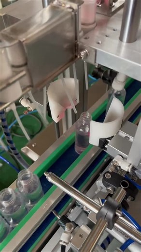 Capping machine for spray bottles