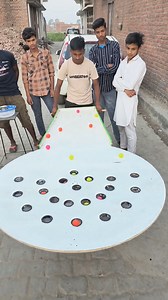 1M views · 2.5K reactions | Put The All Small Small Balls Into The Small Small Holes And Injoy Boys Win Rewards #villagegame #puttingball | Xyz Food Challenge | Facebook
